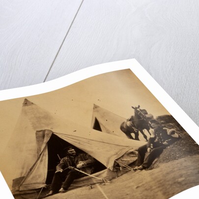 Officer of the 57th Regiment sitting with a sword across his lap at opening to his tent by Roger Fenton