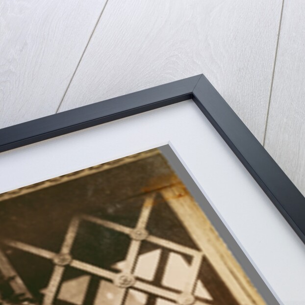 Au Petit Bacchus, rue St. Louis en l'Ile, 61 (Shop Sign, rue St. St. Louis en l'Ile) by Eugène Atget