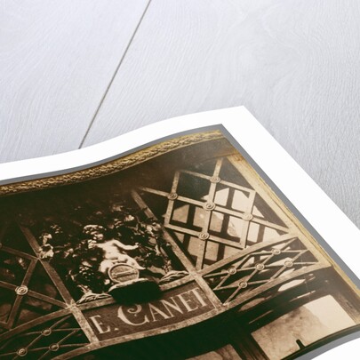 Au Petit Bacchus, rue St. Louis en l'Ile, 61 (Shop Sign, rue St. St. Louis en l'Ile) by Eugène Atget