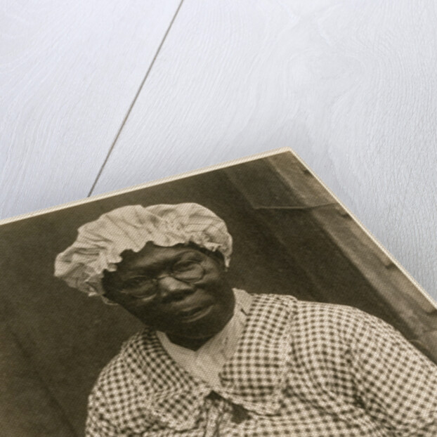 Black Woman in Cap and Gingham Dress by Doris Ulmann