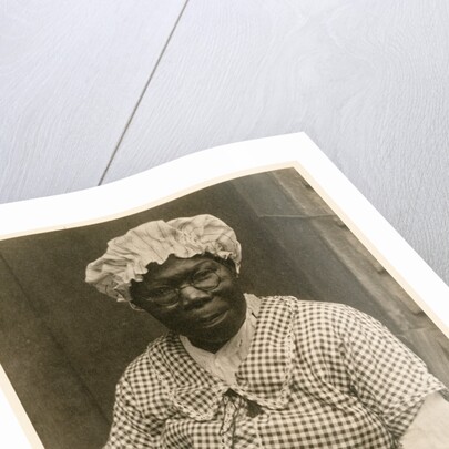 Black Woman in Cap and Gingham Dress by Doris Ulmann