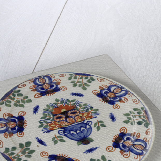 Plate with flower basket by Anonymous