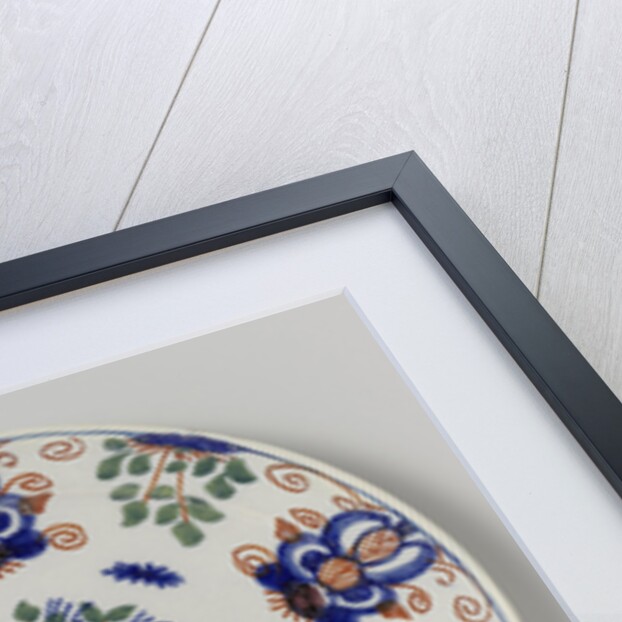 Plate with flower basket by Anonymous