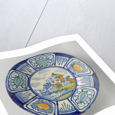 Plate, polychrome-painted the flat landscape with houses and a drawbridge; edge with five courses a stylized flower. by Anonymous