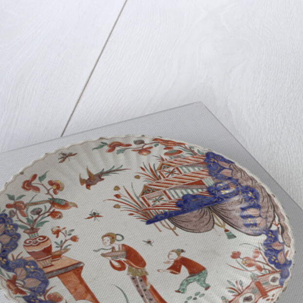 Round dish polychrome painted earthenware with Japanese decor by Anonymous