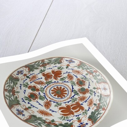 Plate polychrome faience painted with flower decoration by Anonymous