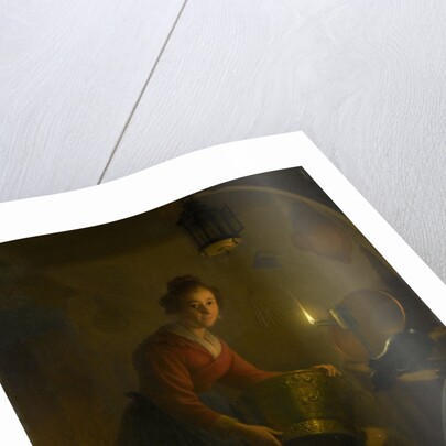 A Woman in a Kitchen by Candlelight by Michiel Versteegh