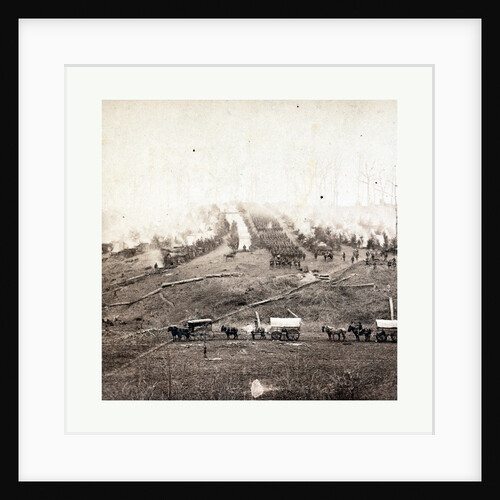 American Civil War: Three Horse-Drawn Covered Wagons in the Foreground. Soldiers Marching in Formation Between Rows of Small Cabins and Tents in the Background by Anonymous