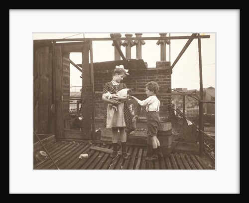 Marba (?) And Eckart Titzenthaler, children of the photographer, on the roof of the house Friedrichstrasse, Berlin, with a cock, Germany by Waldemar Titzenthaler