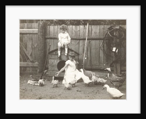 Marba and Eckart Titzenthaler, children of the photographer, standing on a farm with chickens and geese by Waldemar Titzenthaler