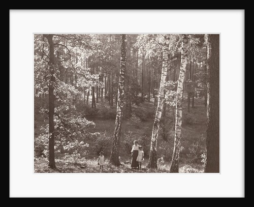 Olga Marba and Eckart Titzenthaler, wife and children of the photographer, standing in a forest by Waldemar Titzenthaler