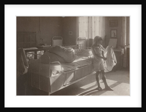 Marba Titzenthaler, daughter of the photographer, in the bedroom of the house Friedrichstrasse, Berlin, Germany by Waldemar Titzenthaler