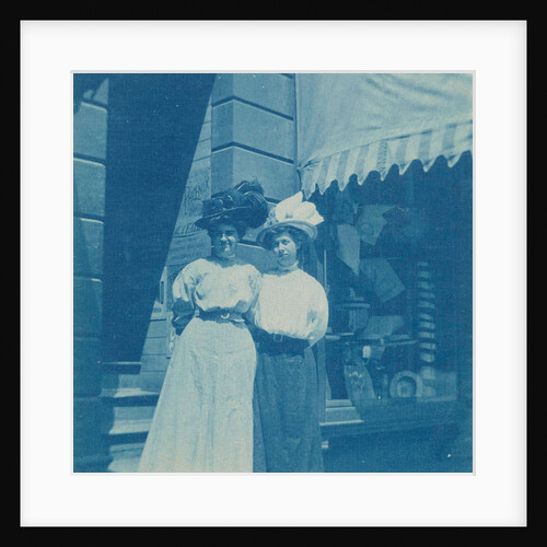 Two women standing at a shop by Anonymous