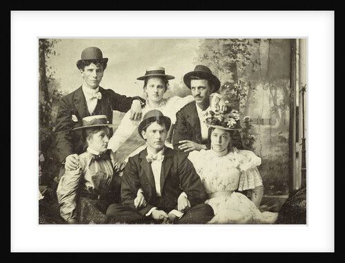 Group portrait of three men and three women, sitting in a studio with painted cloth background (forest or park scene) by Anonymous