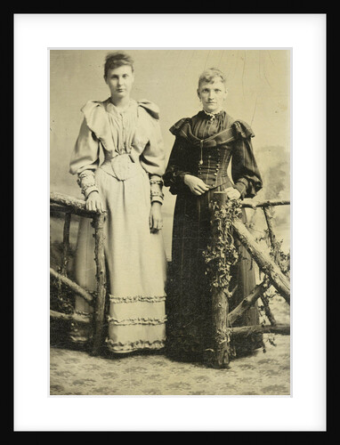 Portrait of two women standing in a studio by Anonymous