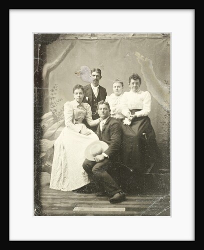 Group portrait of two men and three women, standing and sitting in front of a painted backdrop, tree, rocks by Anonymous