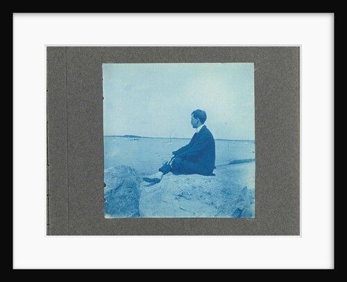 Man in profile, sitting on a rock by the sea, United States, Cyanotype, a photographic printing process that produces a cyan-blue print by Anonymous