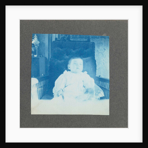 Child sitting in a chair, USA by Anonymous