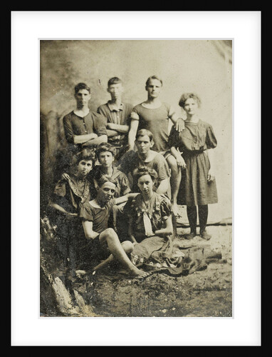 Group portrait of five men and five women (partly) in swimwear, standing and sitting in a studio setting by Anonymous