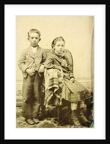 Portrait of a girl and boy, Sitting and standing in a studio setting by Anonymous