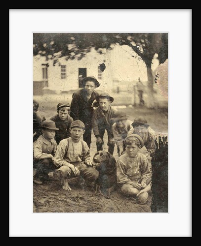 Group portrait of nine boys and a dog, standing and sitting in the open air by Anonymous