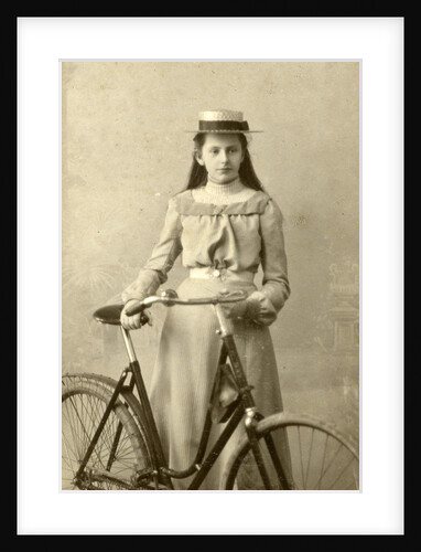 Portrait of young woman in dress with ladies bike by Alex van Dijck