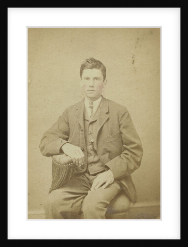 Two women and a man posing in a ferrotypietent by Anonymous