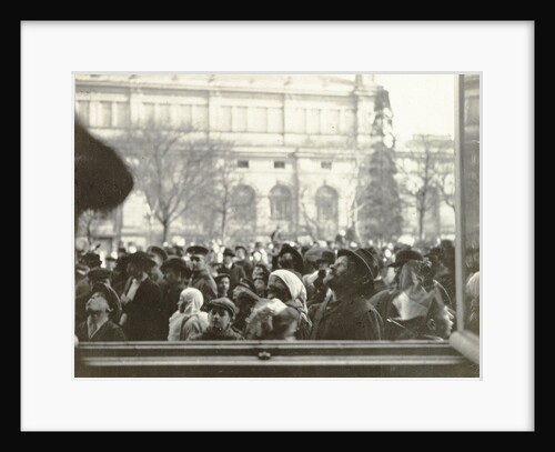 People crowd seen through the window of a house by Anonymous