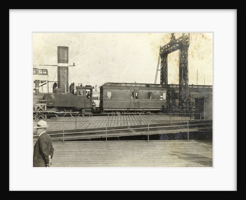 Locomotive and train at a railway yard by Anonymous