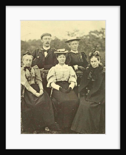 Group portrait of four women and one man around a table in the open air by Anonymous