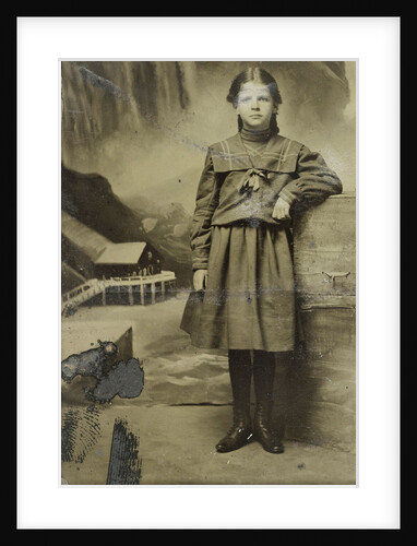 Portrait of a girl in front of a painted backdrop of Niagara Falls by Anonymous
