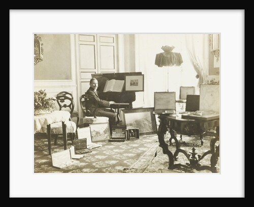 Unknown man, possibly Miko, sitting behind a piano by Anonymous
