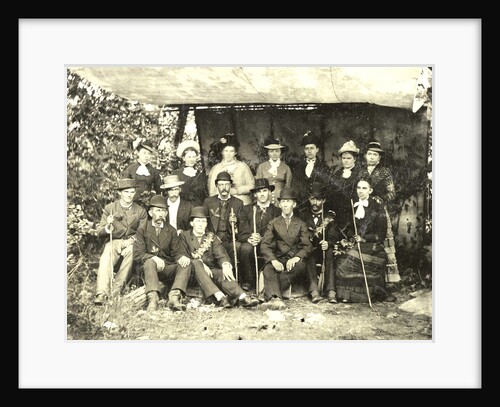 Group portrait of hikers in a makeshift studio by Anonymous