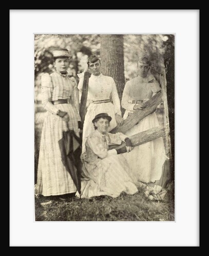 Portrait of four women at a fence and trees by Anonymous