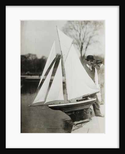 Toy Boat in a pond in Central Park, New York City by George Grantham Bain