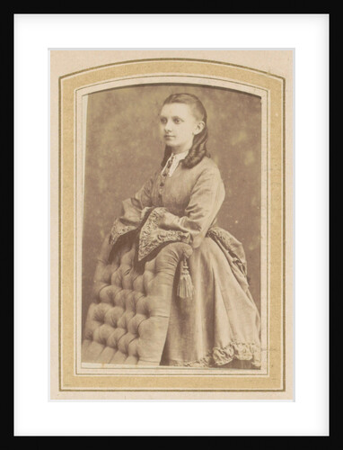 Portrait of a Young Woman in a dress leaning on a chair by De Lavieter & Co.