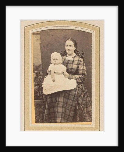 Portrait of a woman in a plaid dress with a baby on lap by E. Steffen