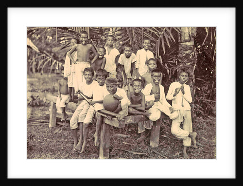 Laughing children with flute, ball and bicycle in Ambon, Indonesia by Anonymous