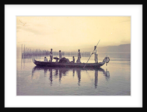 Men in a canoe in the bay of Ambon, Indonesia by Anonymous