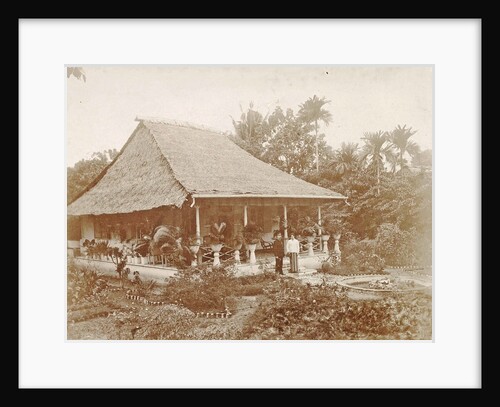 Man and woman posing for a house with a garden in Ambon, Indonesia by Anonymous