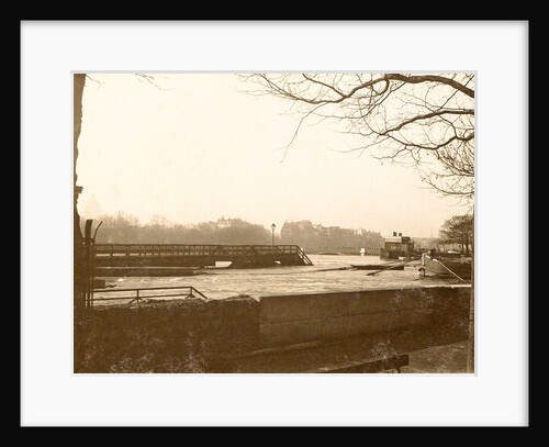 High water in the Seine in Paris, in the foreground a quay wall, France by Anonymous