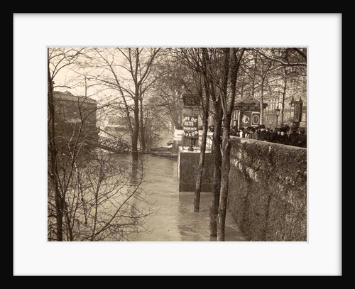 People watching from the wharf to the high water level of the Seine in Paris by Anonymous