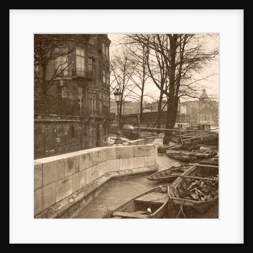 Boats along a quay during the flooding of Paris, France by Anonymous