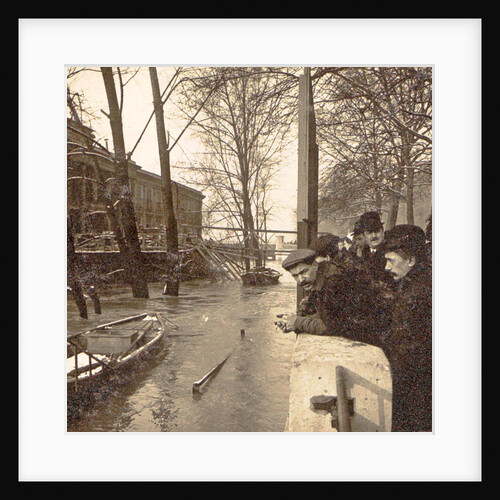 People watching from the wharf to the high water level of the Seine in Paris France by Anonymous
