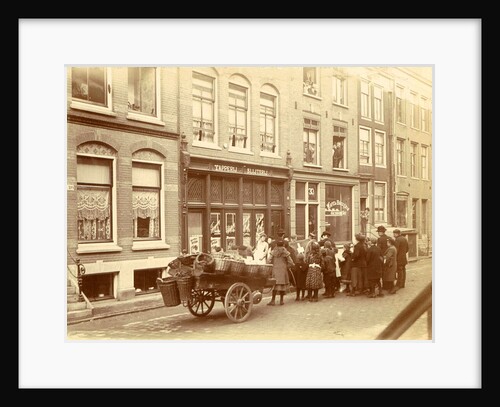 Children and adults watch the work for a liquor store and waffle bakery Jac. van der Zee by Anonymous