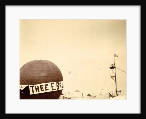 air balloon advertising for 'Tea E Brandsma in the background a tightrope walker over a fairground by Anonymous