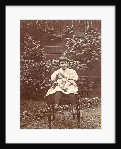 Sitting girl with a doll in a garden by Anonymous