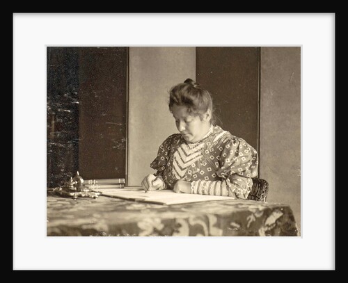 woman writing at a table by Anonymous