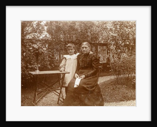 Woman with a child at a table in a garden by Anonymous