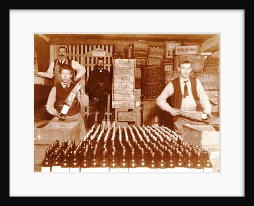 Men packaged bottled beverage bottles in crates by Anonymous